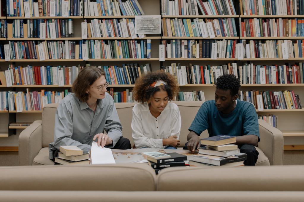 diverse group of students studying at the library