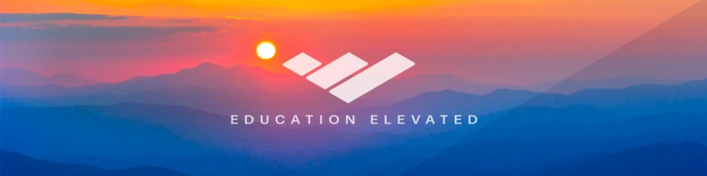 View of the Blue Ridge mountains with the campus logo.